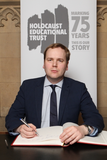 William signs Holocaust Educational Trust’s Book of Commitment
